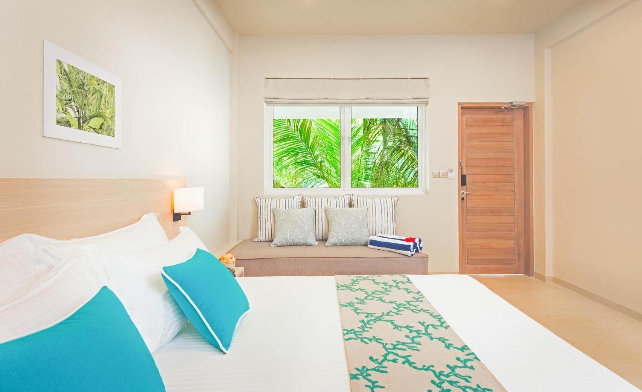 มลาฮินี กูดา บันดอส รีสอร์ต Hotel ฮุลฮูมาเล ภายนอก รูปภาพ Deluxe Beach Villa