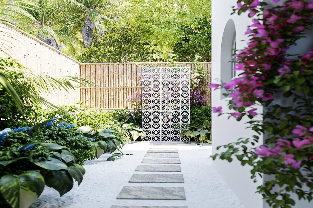 มลาฮินี กูดา บันดอส รีสอร์ต Hotel ฮุลฮูมาเล ภายนอก รูปภาพ 3D rendering of a garden