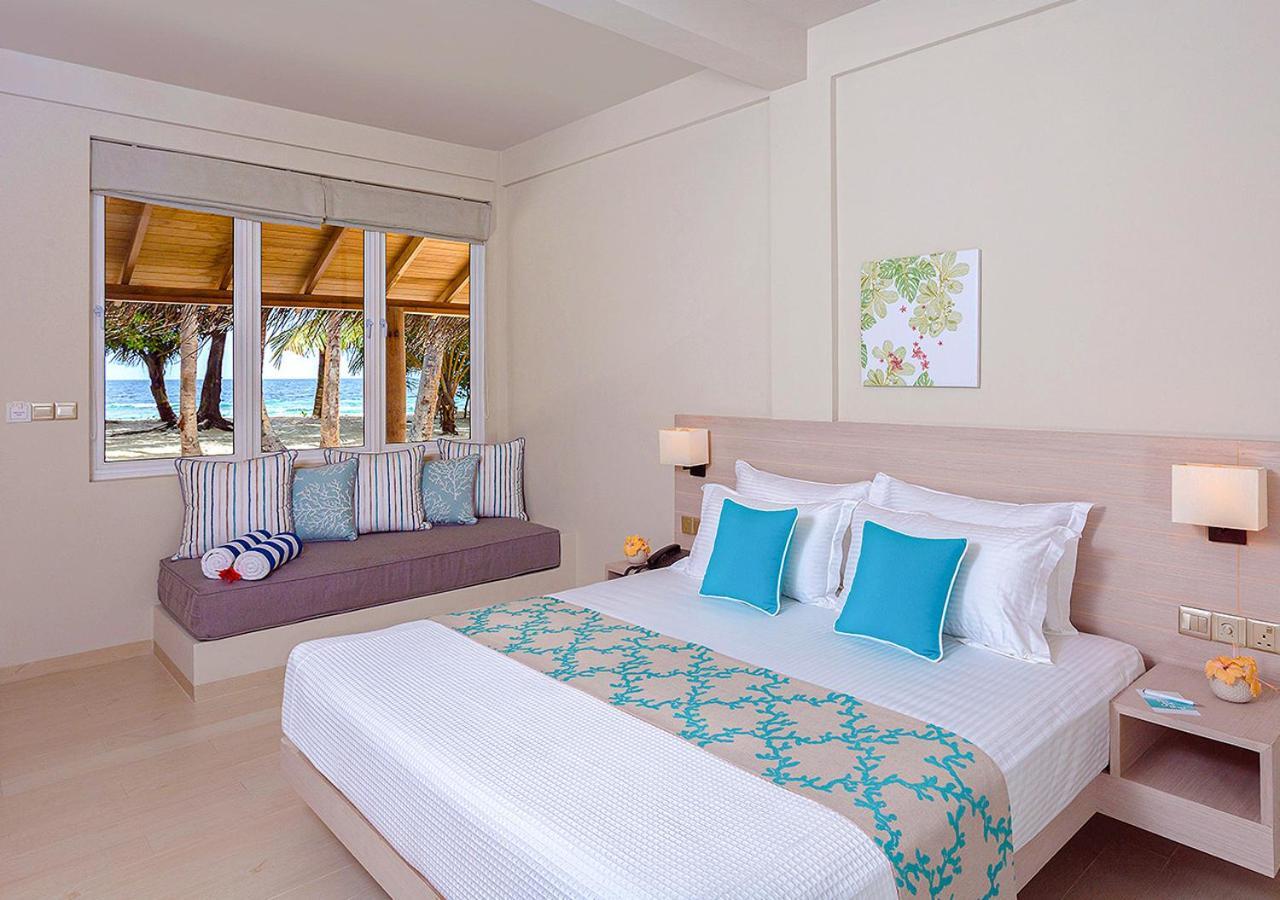 มลาฮินี กูดา บันดอส รีสอร์ต Hotel ฮุลฮูมาเล ภายนอก รูปภาพ Beach Villa